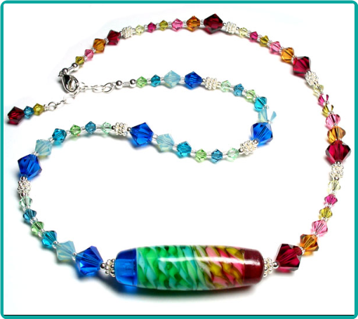 Unique asymmetric rainbow colored lampwork and crystal necklace