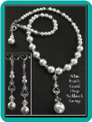 White Pearl and Crystal Scroll Drop Necklace & Earrings